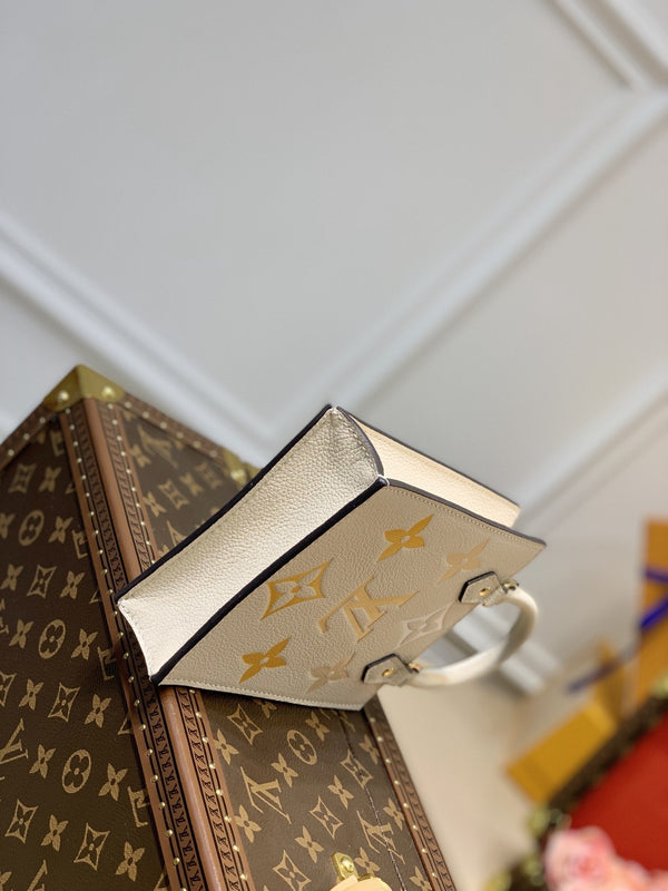 LV PETIT SAC PLAT CREMA MONOGRAM EMPREINTE PELLE DI VITELLO