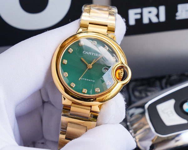 BALLON BLEU 33MM GOLD GREEN DIAL DIAMOND NUMERALS