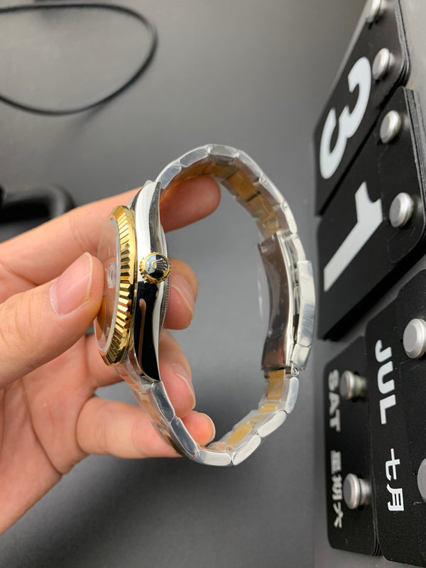 SKY DWELLER ORO ACCIAIO QUADRANTE NERO