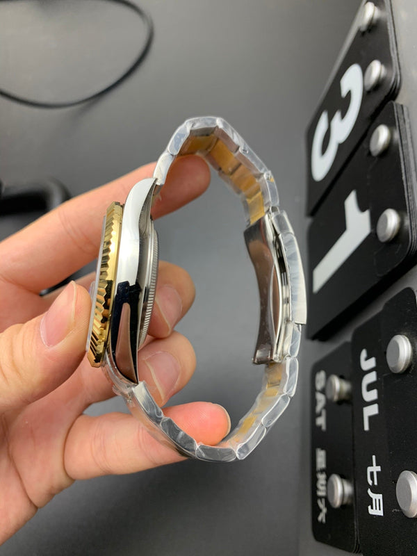 SKY DWELLER ORO ACCIAIO QUADRANTE NERO