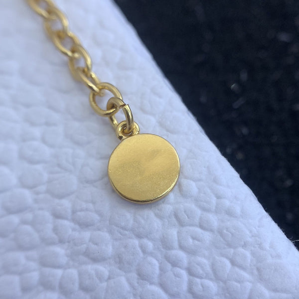 Collana con ciondolo a forma di stella in oro con pendente a forma di mocio