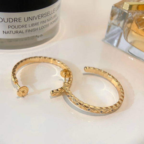 ORECCHINI A CERCHIO CON DIAMANTI CRUSH