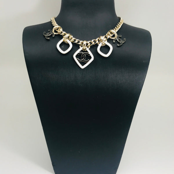 MULTI CHARM PINK GOLD BLACK ENAMEL NECKLACE