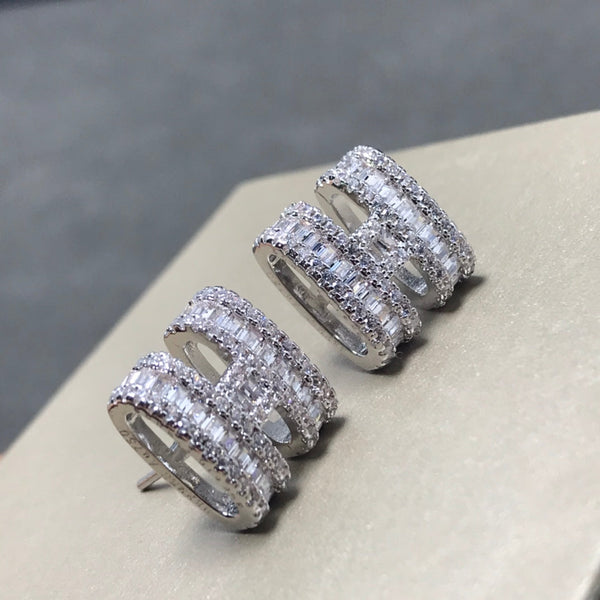ORECCHINI IN ARGENTO CON DIAMANTI CLIC H