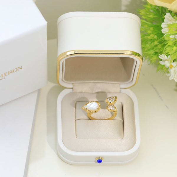 ANELLO BOHEME IN ORO CON 3 MOTIVI E DIAMANTI