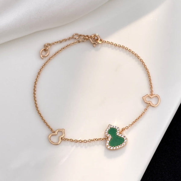 BRACCIALE WULU IN ORO ROSA CON 3 MOTIVI DI DIAMANTI