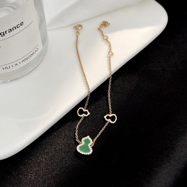 BRACCIALE WULU IN ORO ROSA CON 3 MOTIVI DI DIAMANTI