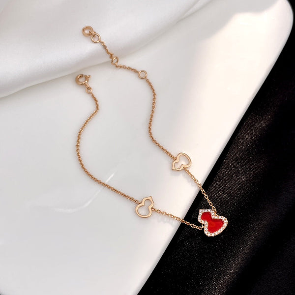 BRACCIALE WULU IN ORO ROSA CON 3 MOTIVI DI DIAMANTI