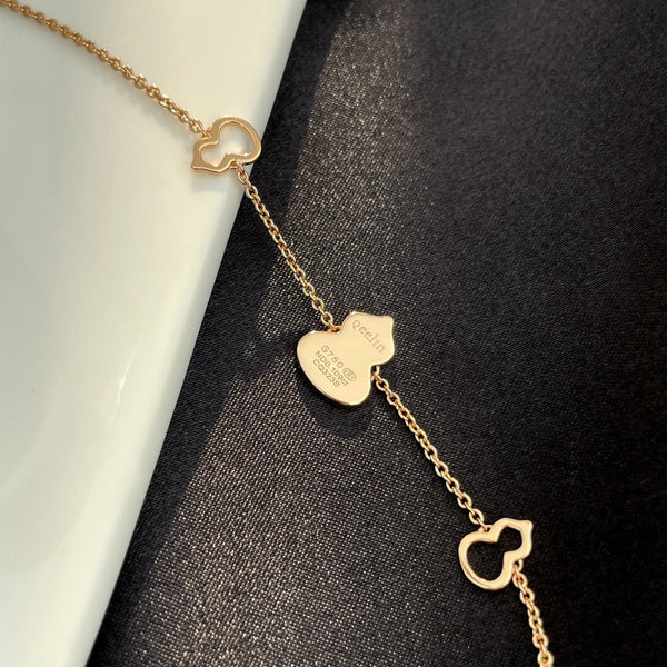 BRACCIALE WULU IN ORO ROSA CON 3 MOTIVI DI DIAMANTI