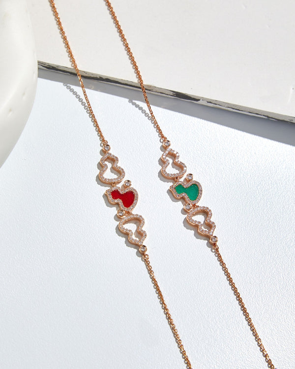 BRACCIALE WULU IN ORO ROSA CON 3 MOTIVI DI DIAMANTI