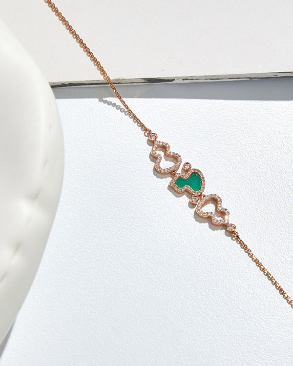 BRACCIALE WULU IN ORO ROSA CON 3 MOTIVI DI DIAMANTI