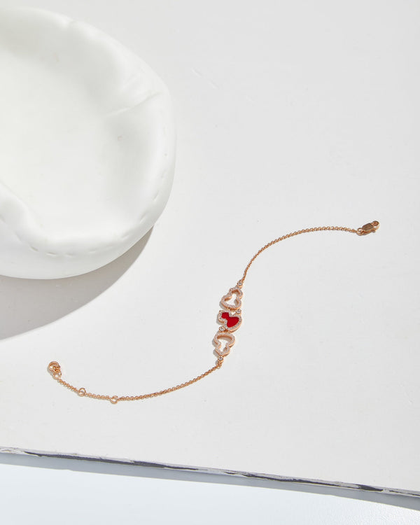 BRACCIALE WULU IN ORO ROSA CON 3 MOTIVI DI DIAMANTI