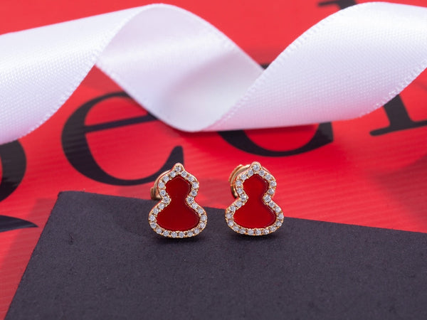 ORECCHINI A PERNO IN ORO ROSA CON DIAMANTI E CORNIOLA WULU