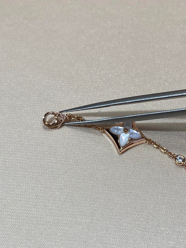 BRACCIALE IN ORO ROSA CON MOTIVO A 4 STELLE E DIAMANTI