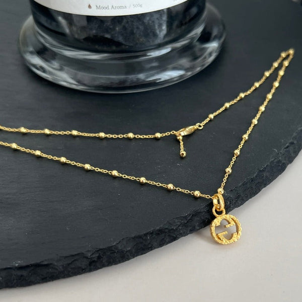 COLLANA IN ORO CON CATENA A PALLINE GG