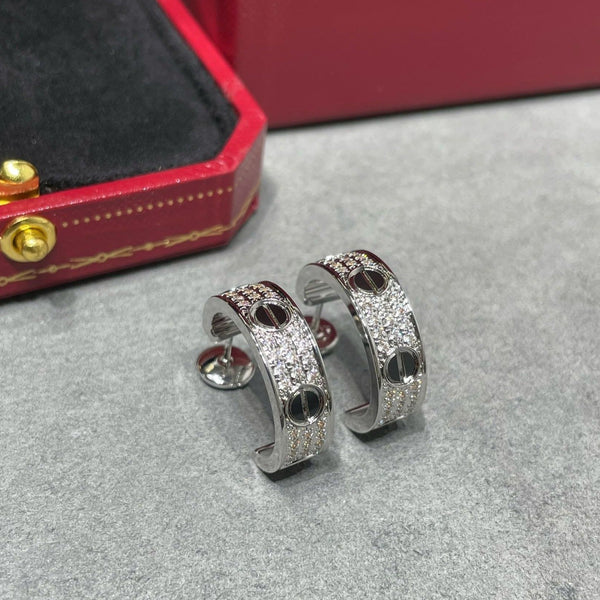 ORECCHINI IN ARGENTO CON PAVE' DI DIAMANTI IN CERAMICA LOVE