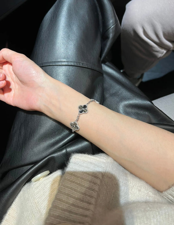 BRACCIALE IN ARGENTO CON 5 MOTIVI CLOVER