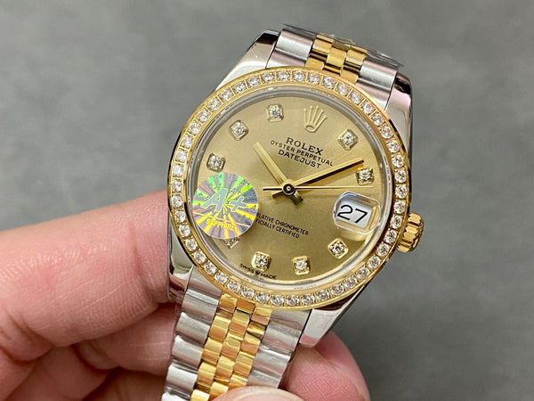 DATEJUST 31MM GOLD STEEL DIAMOND BEZEL YELLOW DIAL