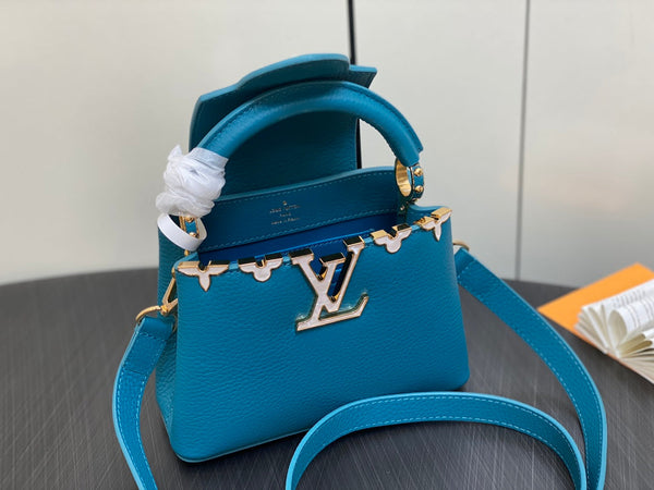 CAPUCINES MINI 21 BLUE TAURILLON GOLD HARDWARE