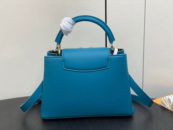 CAPUCINES BB 27 BLUE TAURILLON GOLD HARDWARE