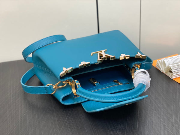 CAPUCINES BB 27 BLUE TAURILLON GOLD HARDWARE