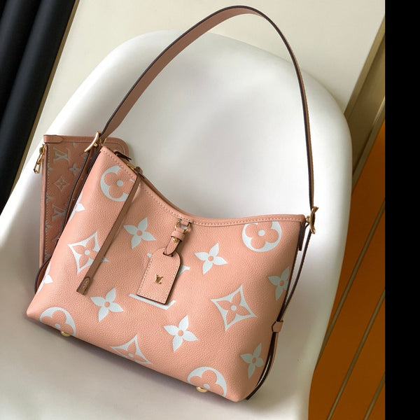 BORSA A TRACOLLA PM 29 IN PELLE DI BUCCA MARTELLATA CON MONOGRAMMA ROSA
