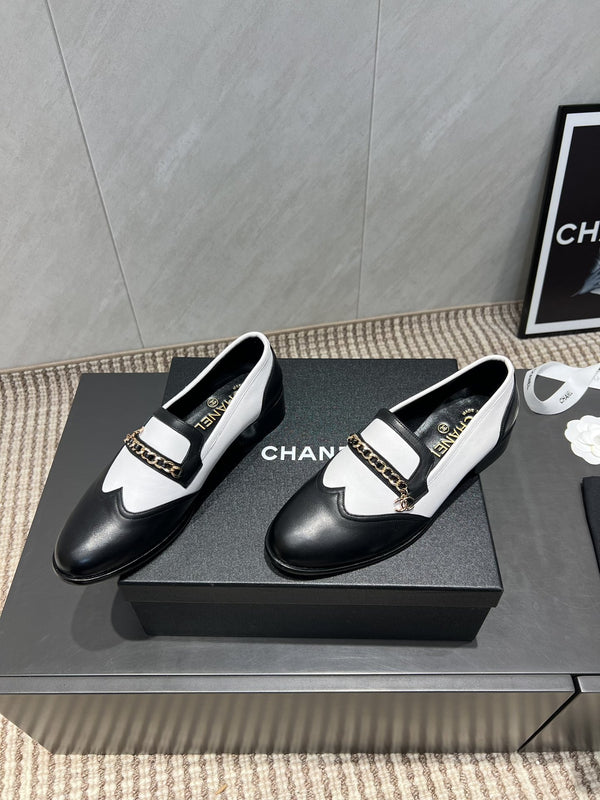 CC 25S Round Toe Chain Loafers in Black and White Cowhide 442533