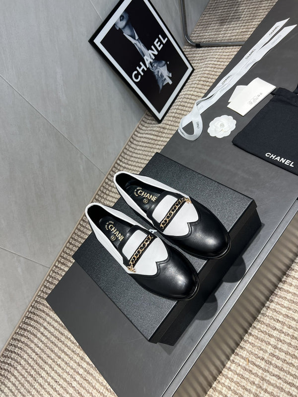 CC 25S Round Toe Chain Loafers in Black and White Cowhide 442533