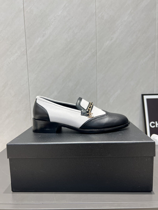 CC 25S Round Toe Chain Loafers in Black and White Cowhide 442533