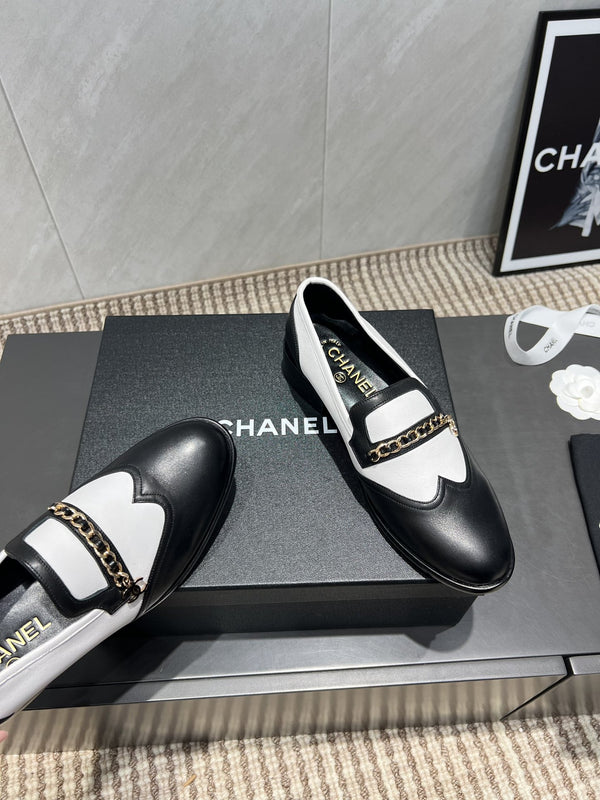 CC 25S Round Toe Chain Loafers in Black and White Cowhide 442533