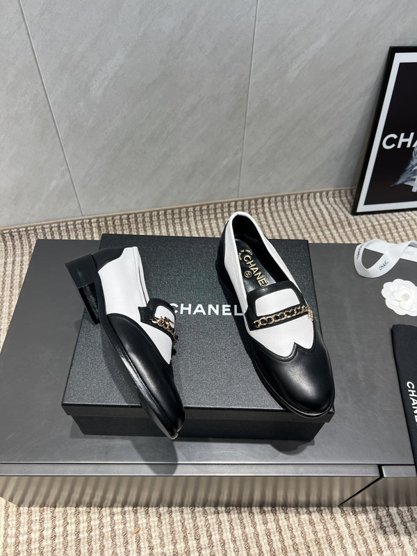 CC 25S Round Toe Chain Loafers in Black and White Cowhide 442533