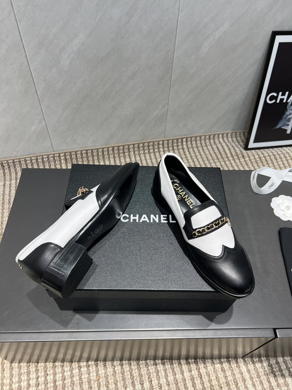 CC 25S Round Toe Chain Loafers in Black and White Cowhide 442533