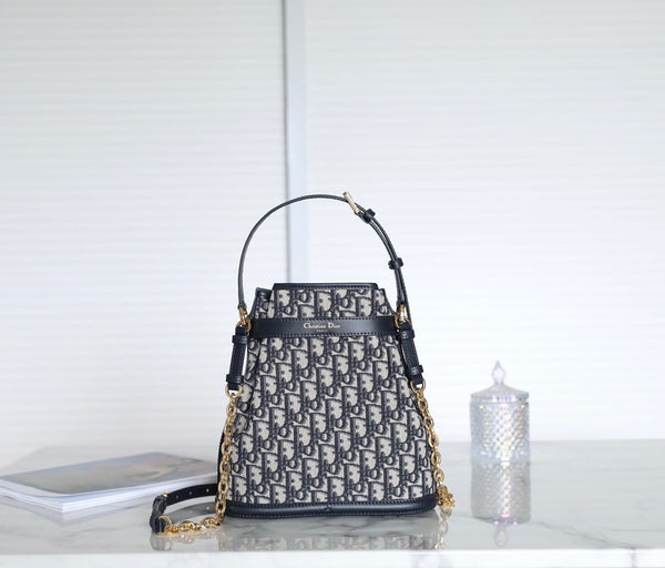 MONTAIGNE MEDIUM 24 BUCKET BAG IN BLUE OBLIQUE JACQUARD CALFSKIN