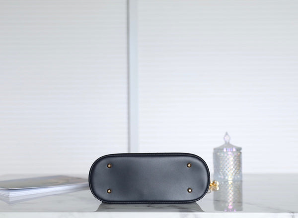 MONTAIGNE MEDIUM 24 BUCKET BAG IN BLUE OBLIQUE JACQUARD CALFSKIN