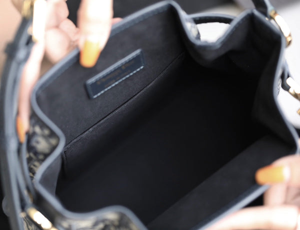 MONTAIGNE MEDIUM 24 BUCKET BAG IN BLUE OBLIQUE JACQUARD CALFSKIN