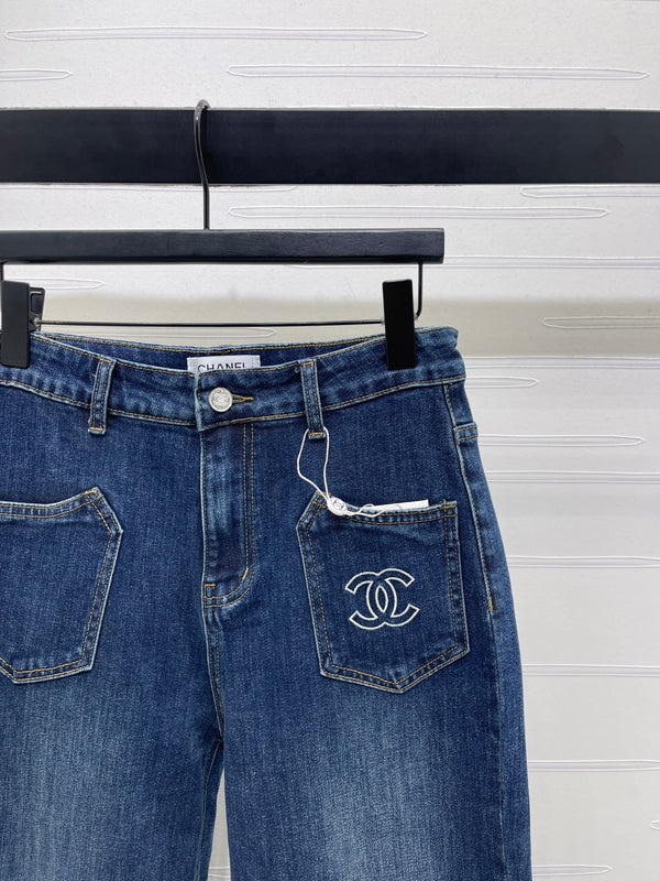 CC 25 Pocket-embroidered high-waisted straight-leg jeans