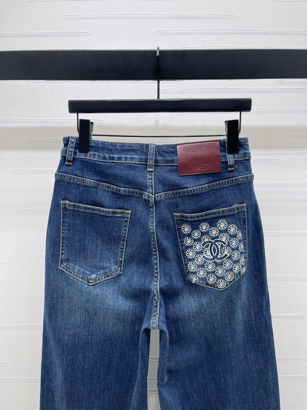 CC 25 Pocket-embroidered high-waisted straight-leg jeans