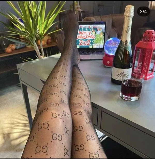 GG logo haute couture semi-transparent black flocked pantyhose
