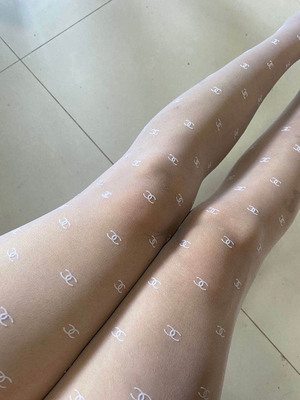 CC high-end couture flocked mini logo pantyhose