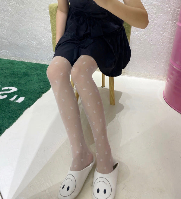 CC high-end couture flocked mini logo pantyhose