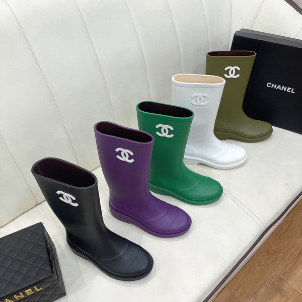 Bottes de pluie vintage Chanel 26 en peau de mouton violette 476070
