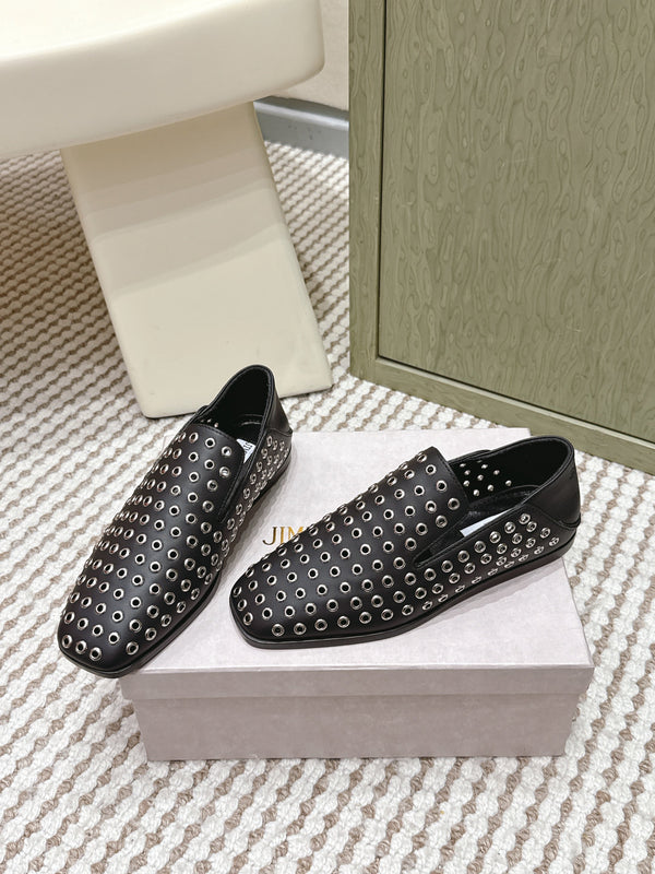 Mules plates Jimmy Choo Eliot Œillets métalliques Cuir de veau noir 568492