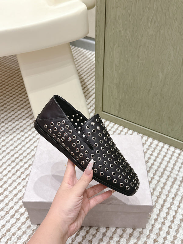 Mules plates Jimmy Choo Eliot Œillets métalliques Cuir de veau noir 568492