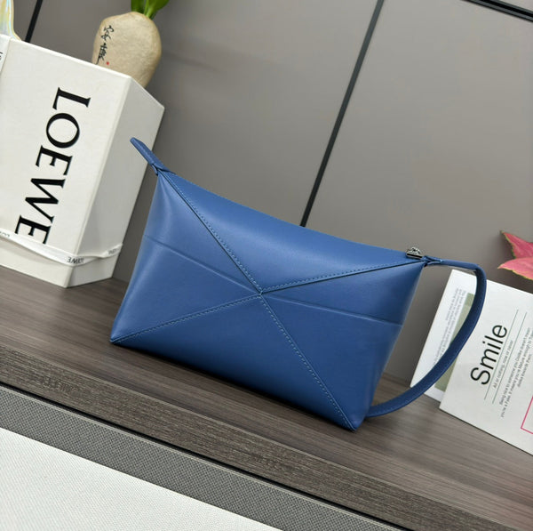 Sac à main Loewe Puzzle Fold 22 cm en cuir de veau brillant bleu 274150