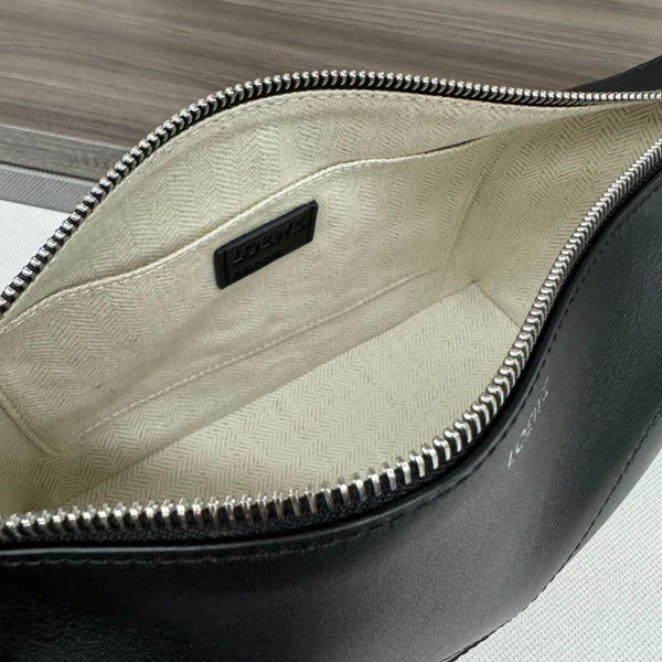 Sac à main Loewe Puzzle Fold 22 cm en cuir de veau brillant noir 274154