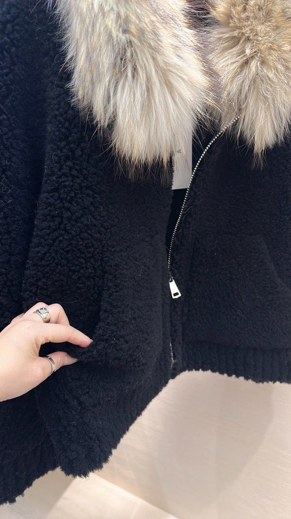 Manteau CELINE en peau lainée noire 333249