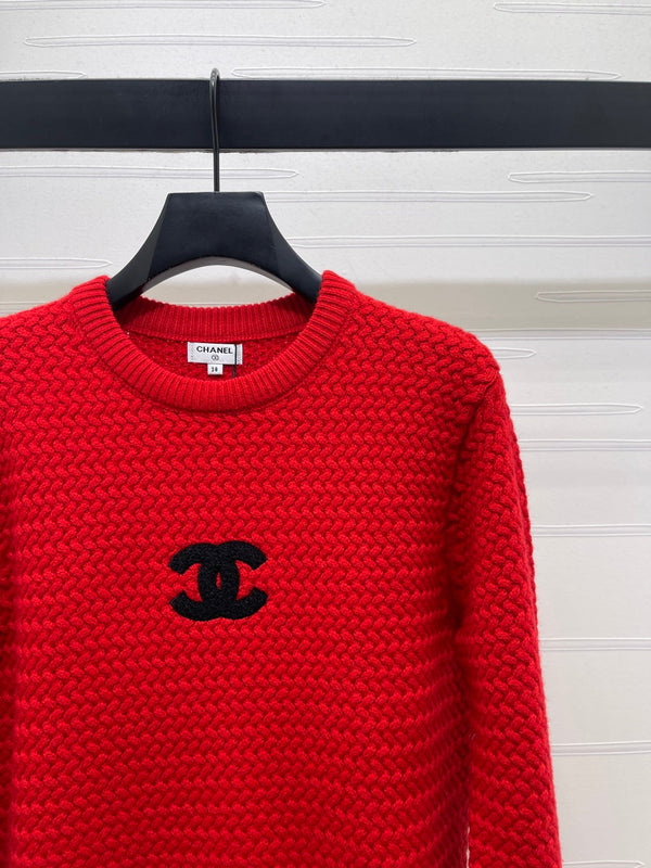 PULL TRICOTÉ ROUGE AVEC LOGO CHANEL 26 335405