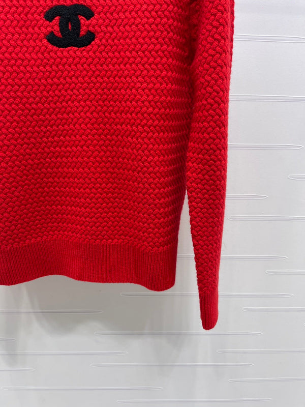 PULL TRICOTÉ ROUGE AVEC LOGO CHANEL 26 335405