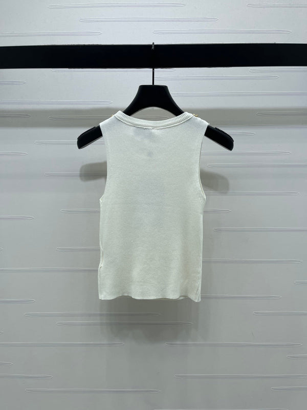 GILET EN MAILLE TRICOTÉE AVEC CHAÎNE CHANEL 26 EN LAINE NOIRE 335389