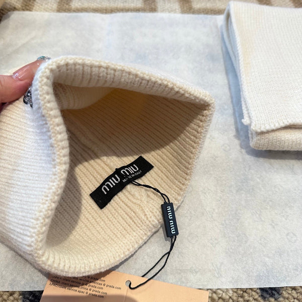 Ensemble en maille de laine crème Miu Miu 979749